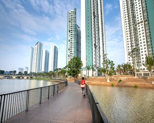 A modern pedestrian walking path near a residential building project